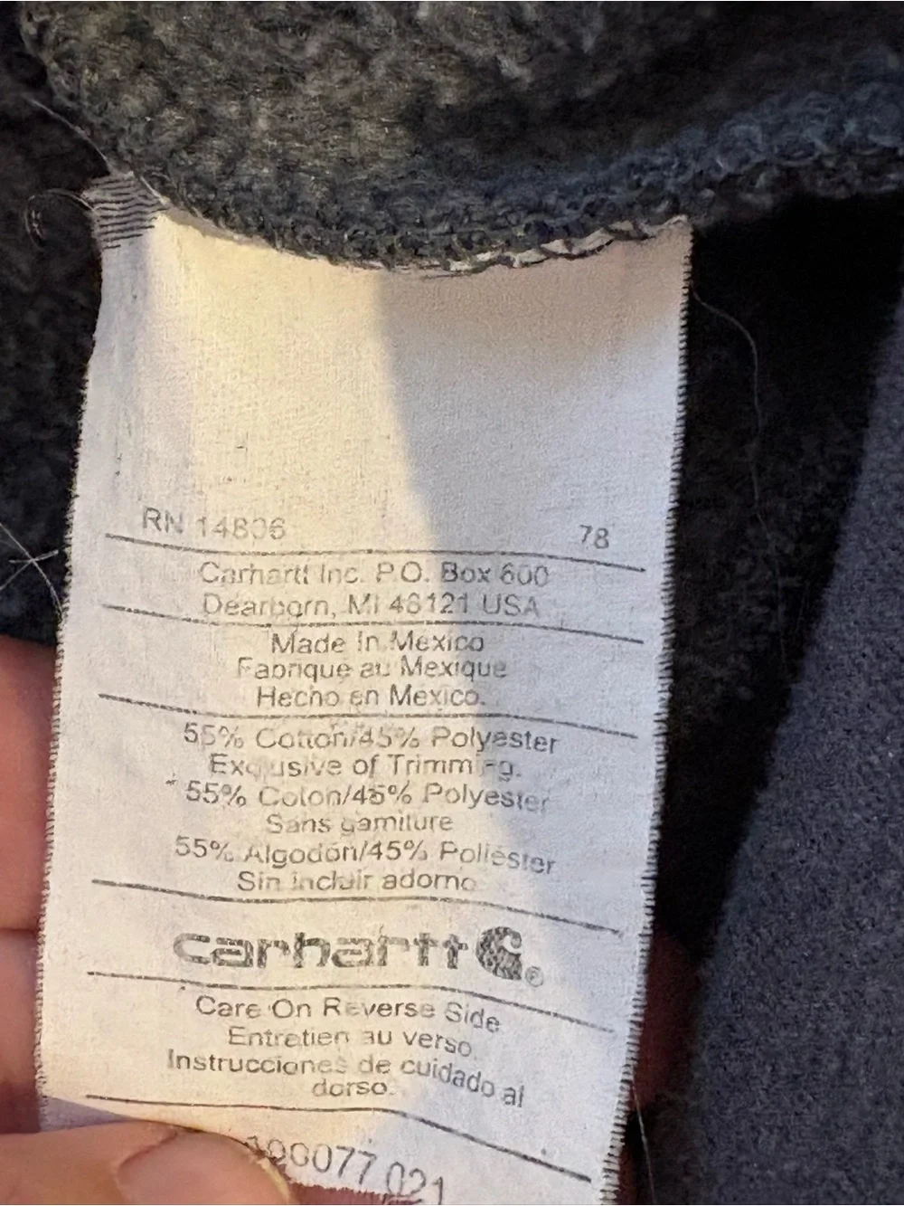 Carhartt Y2K Charcoal Gray Zip-Up Hoodie with Vertical Logo and Orange Accent.